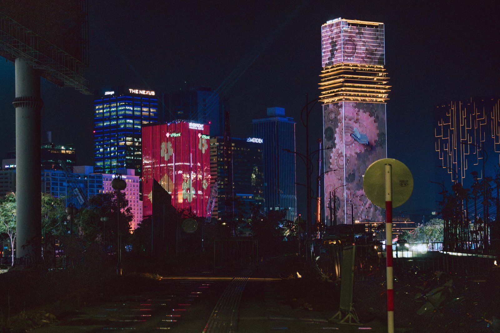 Night view of illuminated buildings in Ho Chi Minh City.