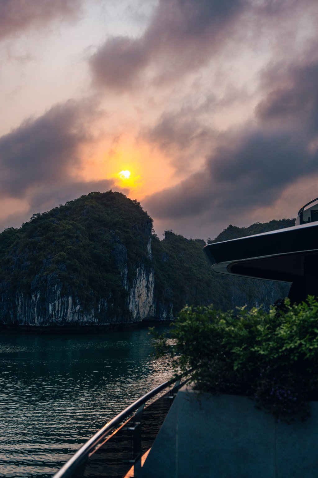 ha long bay overnight cruise lan ha bay sunset clouds karsts at Tulip Cruise