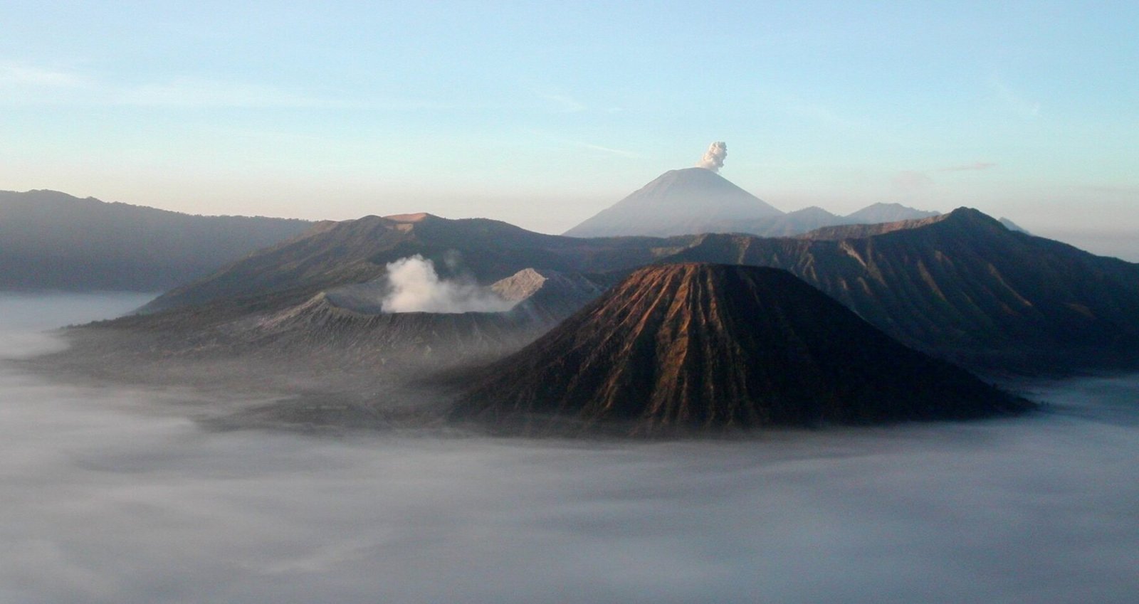Cloud and mist around Mount Bromo and Semeru at sunrise in East Java.