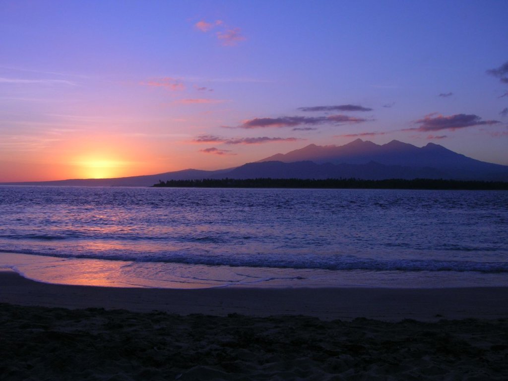 Sunrise over Lombok and Mount Rinjani from the Gili Islands.